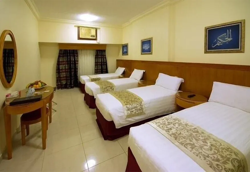 4 Single beds room