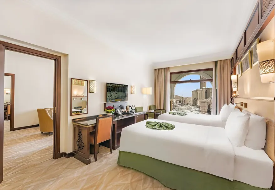 /media/umrah-images/2-single-beds-in-%20the-room.webp