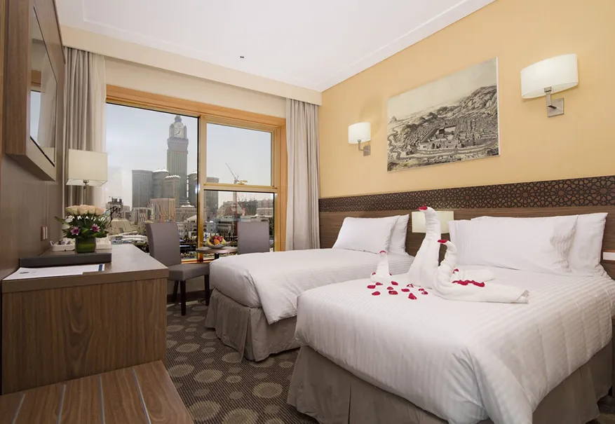 /media/umrah-images/2-single-beds-in-the-room%20%281%29.webp