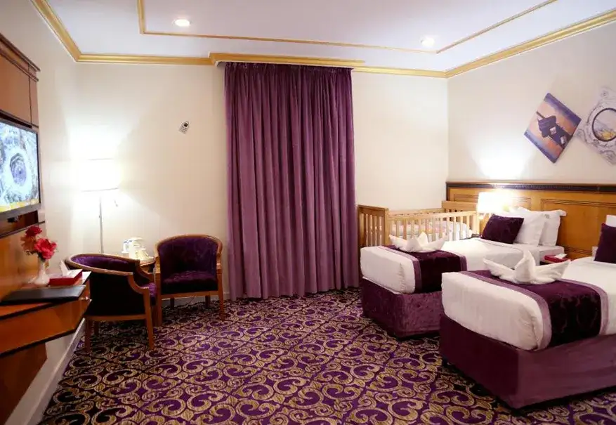 /media/umrah-images/room-with-2-single-bed.webp