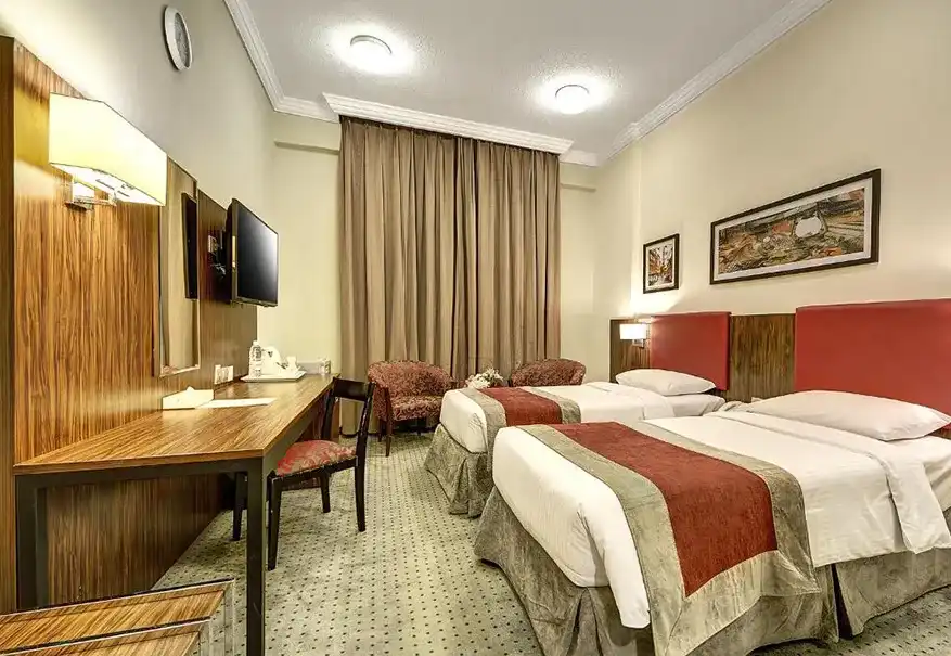 /media/umrah-images/room-with-2-single-beds%20%282%29.webp