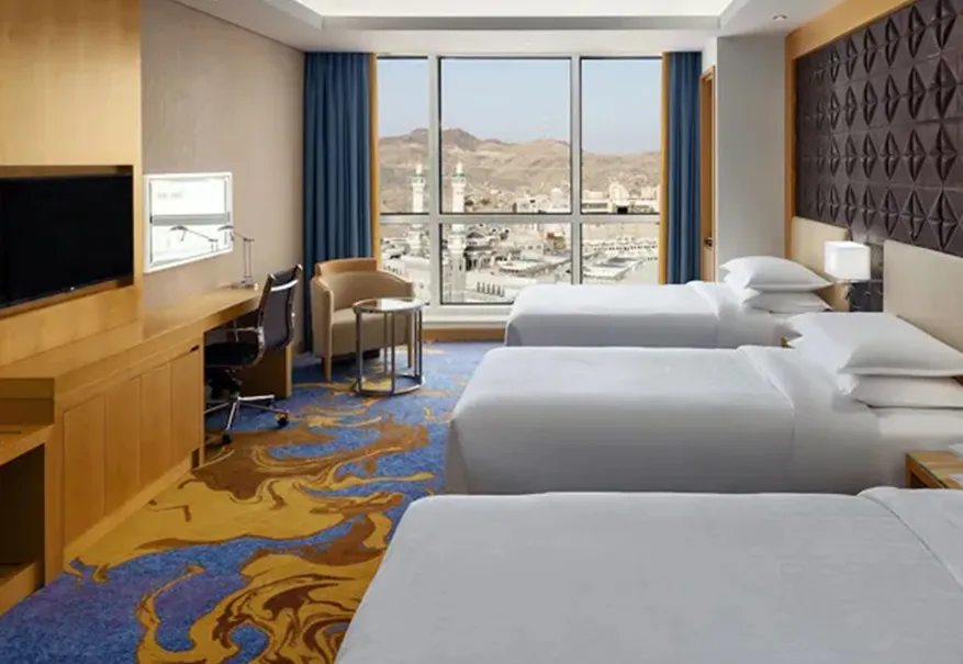 /media/umrah-images/room-with-3-single-beds%20%287%29.webp